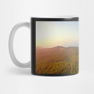 Aerial view of sunset over mountain jungle Mug